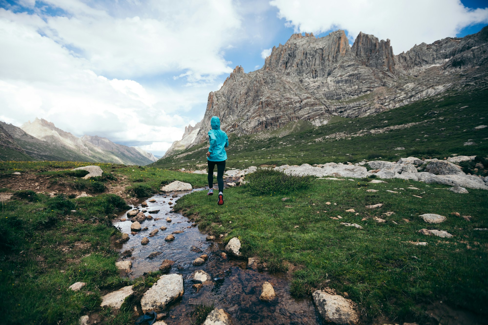 Ultra marathon runner running at high altitude mountains